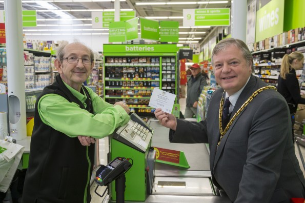 Personal delivery of an invitation to Roy Pennington, who is very popular with customers at Worcester's Asda store