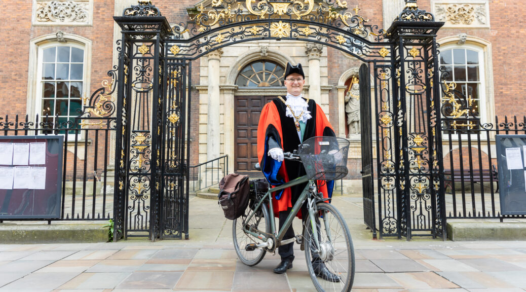 The new Mayor of Worcester, Councillor Louis Stephen, outside the Guildhall with his bike