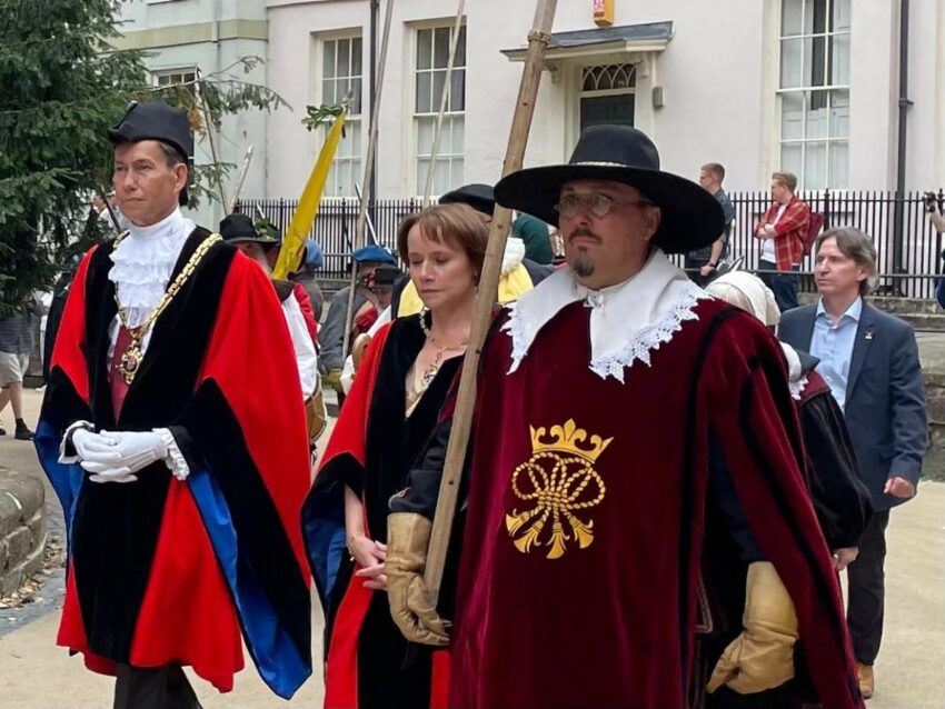 The Mayor and Mayoress  parading through a Worcester street with men in Civil War costumes