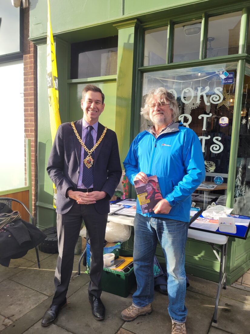 Cllr Dr Matt Lamb (left) with an Amnesty International member
