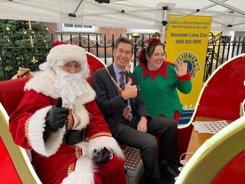 Cllr Dr Matt Lamb with the Worcester Lions and the Guides