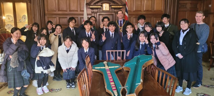 The Mayor with a group of Japanese students, in the Guildhall Parlour